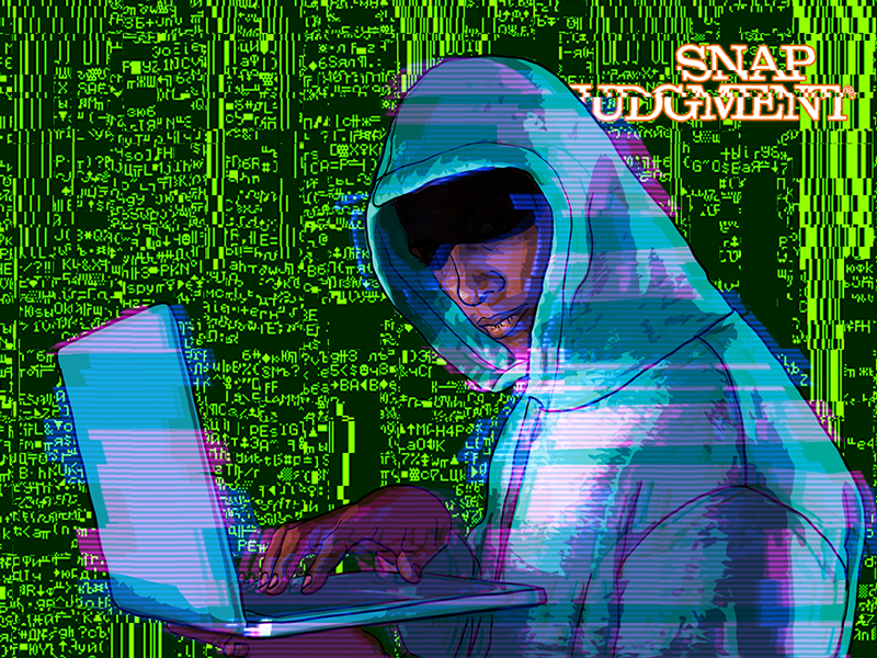 A teenager wearing a hoodie typing on a computer with code as the backdrop.