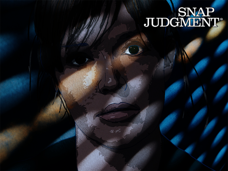 A woman's face in the shadows.