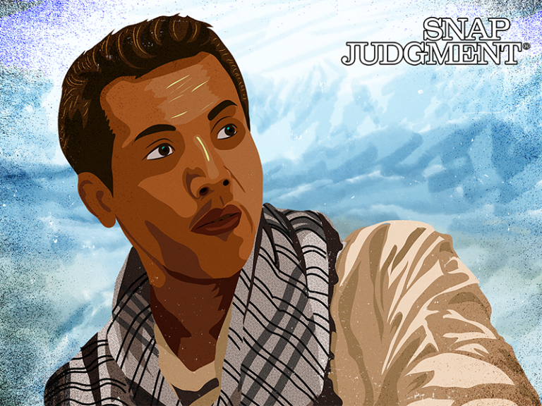 An Afghan man looking up to his left.