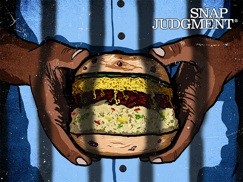 Two hands are holding a bagel sandwich inside a prison cell. The sandwich is seven inches tall.