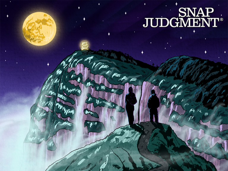 A couple is standing on a majestic mountain top looking at a full moon and waterfall.