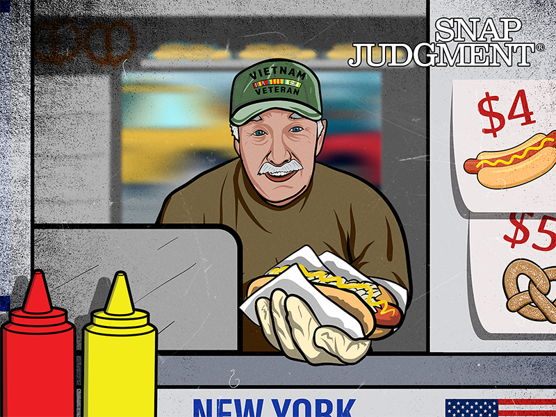 A man inside a hot dog stand is reaching outwards with a hot dog in his hand.