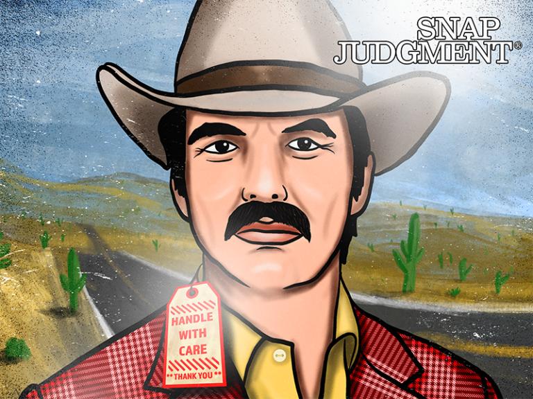 A wax Burt Reynolds statue is pictured. He is wearing a cowboy hat and has his iconic mustache.