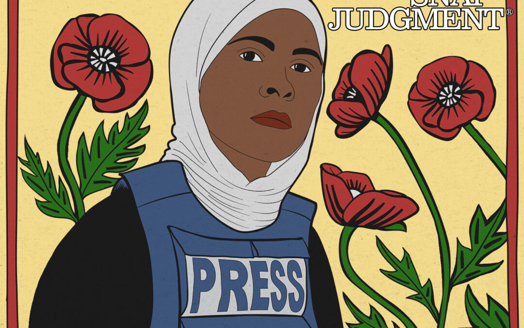 A woman wearing a hijab and a press jacket is surrounded by red flowers.