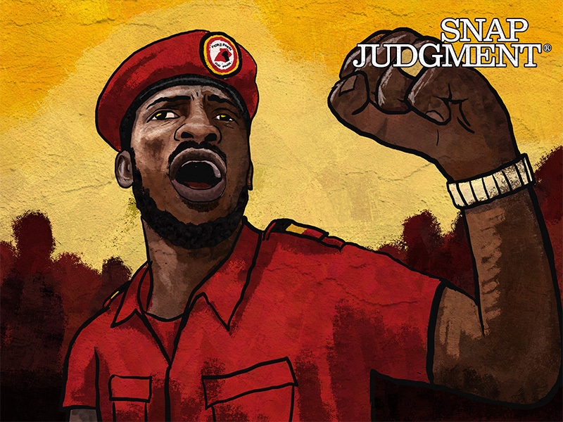 A man is shouting holding up his fist. He is wearing a Ugandan red beret.